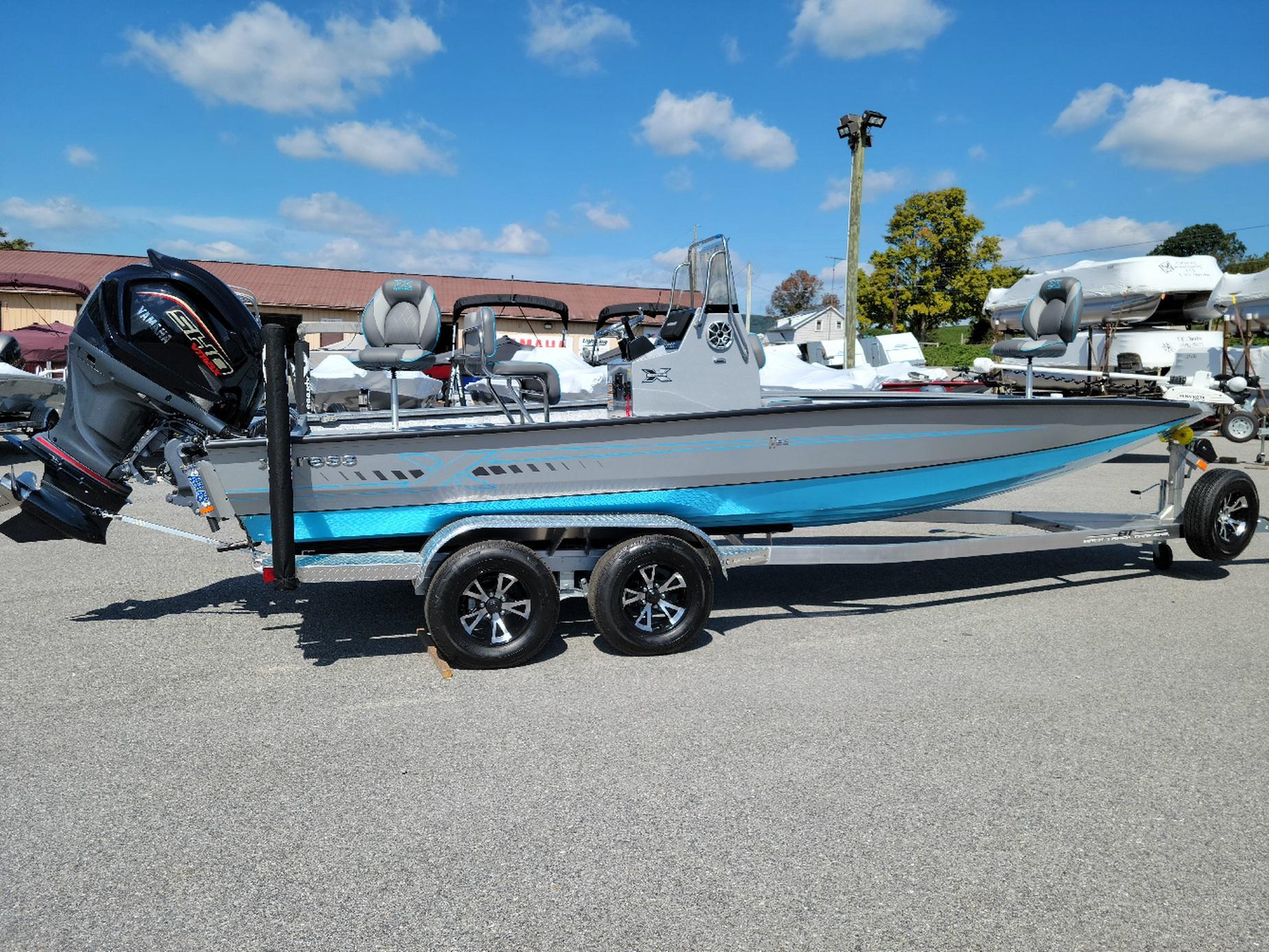Xpress H22 Bay w/ Yamaha Vmax 200 SHO (In stock!) 2025 Xpress H22 Bay boat with Yamaha Vmax 200 SHO engine on trailer.