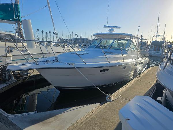 Tiara Yachts 3100 Open LE 2003 Tiara Yachts 3100 Open LE docked at marina under clear sky.