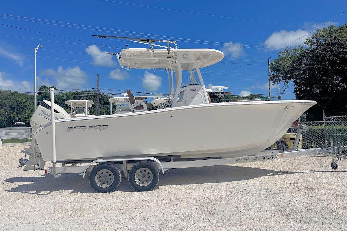 Sea Pro 239 CC 2020 Sea Pro 239 CC boat on trailer under clear blue sky.