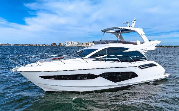 Sunseeker Manhattan 55 2021 Sunseeker Manhattan 55 yacht cruising on open water.