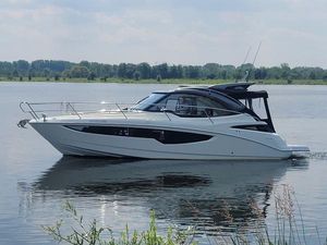 Galeon 335 HTS 2020 Galeon 335 HTS yacht cruising on a calm lake.
