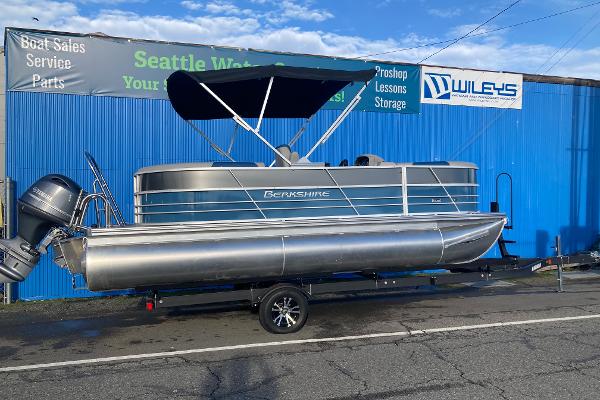 Berkshire 20RFX LE 2024 Berkshire 20RFX LE pontoon boat on trailer outside Wiley's shop.