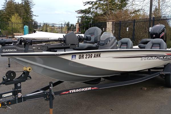 Tracker Pro Team 190 TX 2022 Tracker Pro Team 190 TX boat on trailer, parked outdoors.