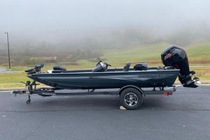 Ranger RT188 2026 Ranger RT188 boat on trailer, foggy landscape background.