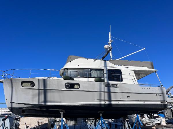 Beneteau Swift Trawler 44 2016 Beneteau Swift Trawler 44 on stands against a clear blue sky.