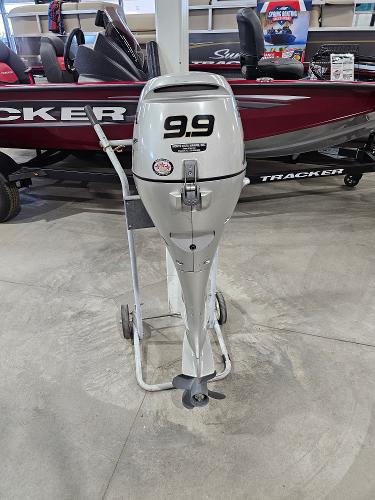 Honda BF9.9D 2007 Honda BF9.9D outboard motor displayed indoors on a stand.