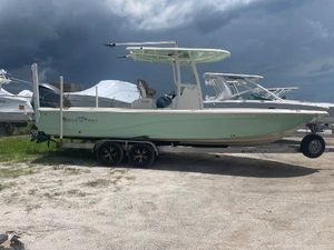 NauticStar 265 XTS 2018 NauticStar 265 XTS boat on trailer under cloudy sky.