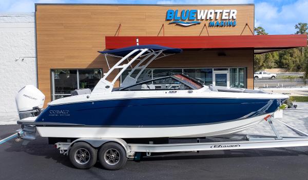 Cobalt R6 Outboard 2025 Cobalt R6 Outboard boat on trailer at Bluewater Marine dealership.