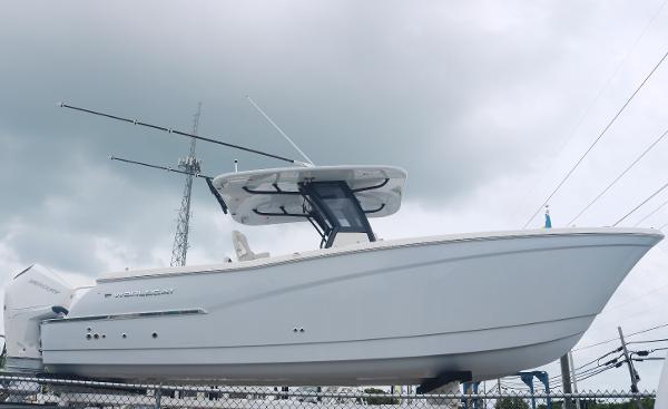 World Cat 280 CC-X 2025 World Cat 280 CC-X boat displayed outdoors under cloudy sky.