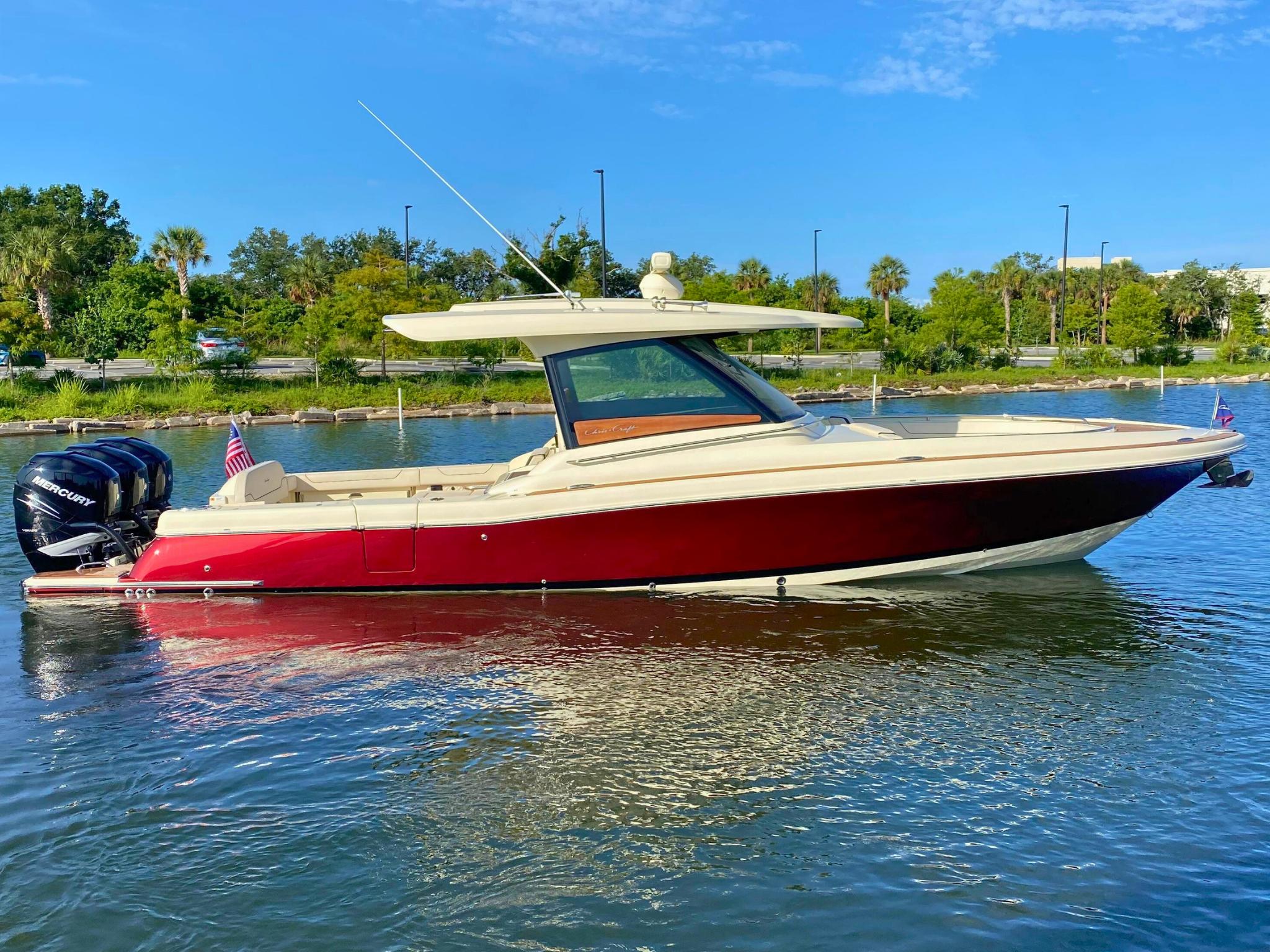 Chris-Craft Calypso 35 2023 Chris-Craft Calypso 35 boat on water, featuring sleek design and powerful engines.