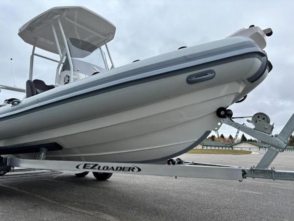 Highfield 660 Sport 2024 Highfield 660 Sport boat on EZ Loader trailer.