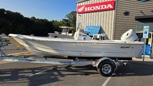 Bulls Bay 2000 2025 Bulls Bay 2000 boat on trailer, parked outside Honda dealership.