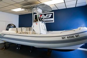 AB Inflatables Oceanus 19 VST 2023 AB Inflatables Oceanus 19 VST boat displayed indoors with Yamaha engine.