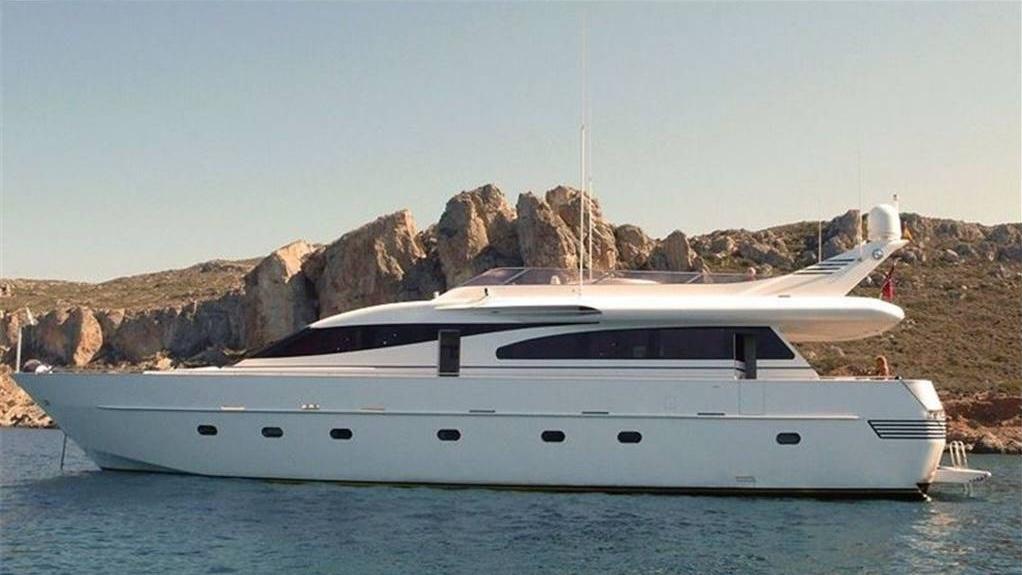 Admiral Ghibli 24 Luxury yacht Admiral Ghibli 24, 2001 model, anchored near rocky coastline.
