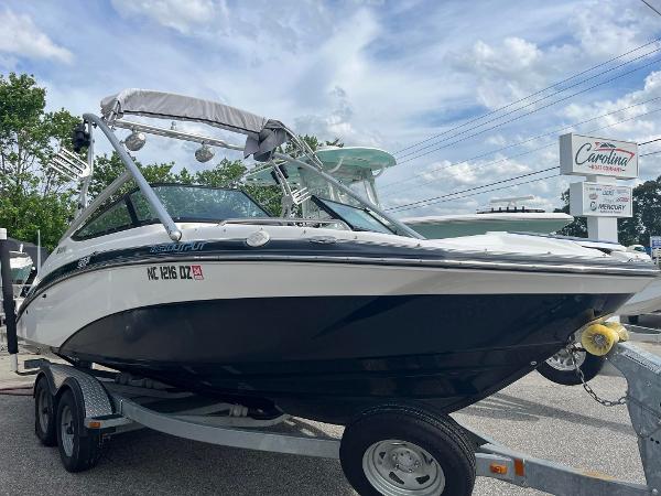 Yamaha Boats 212X 2013 Yamaha Boats 212X on trailer, black and white, parked outdoors.