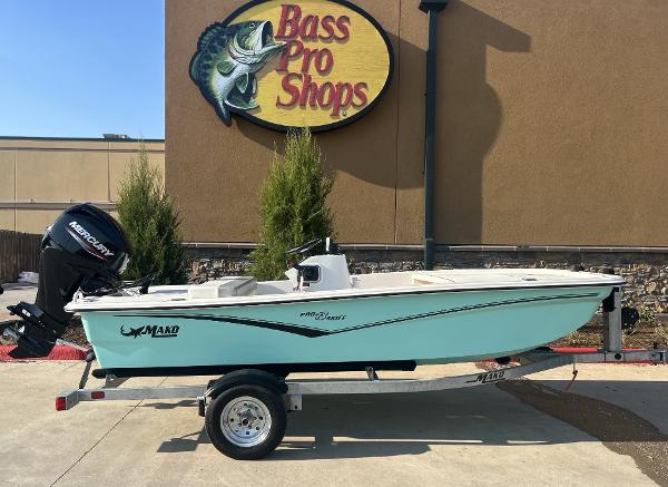 Mako Pro Skiff 13 CC 2024 Mako Pro Skiff 13 CC boat displayed outside Bass Pro Shops.
