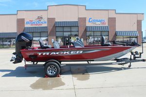 Tracker Pro Team 195 2026 Tracker Pro Team 195 boat on trailer outside dealership.