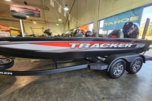 Tracker Savage 215 2026 Tracker Savage 215 boat displayed indoors on a trailer.