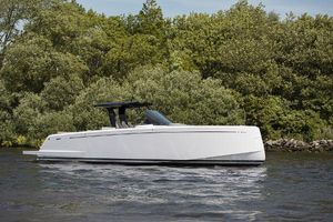 Pardo Yachts 38 2025 Pardo Yachts 38 cruising on a serene waterway with lush greenery in the background.
