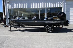 Ranger RT178 2026 Ranger RT178 boat with Mercury engine on trailer, parked outside a building.