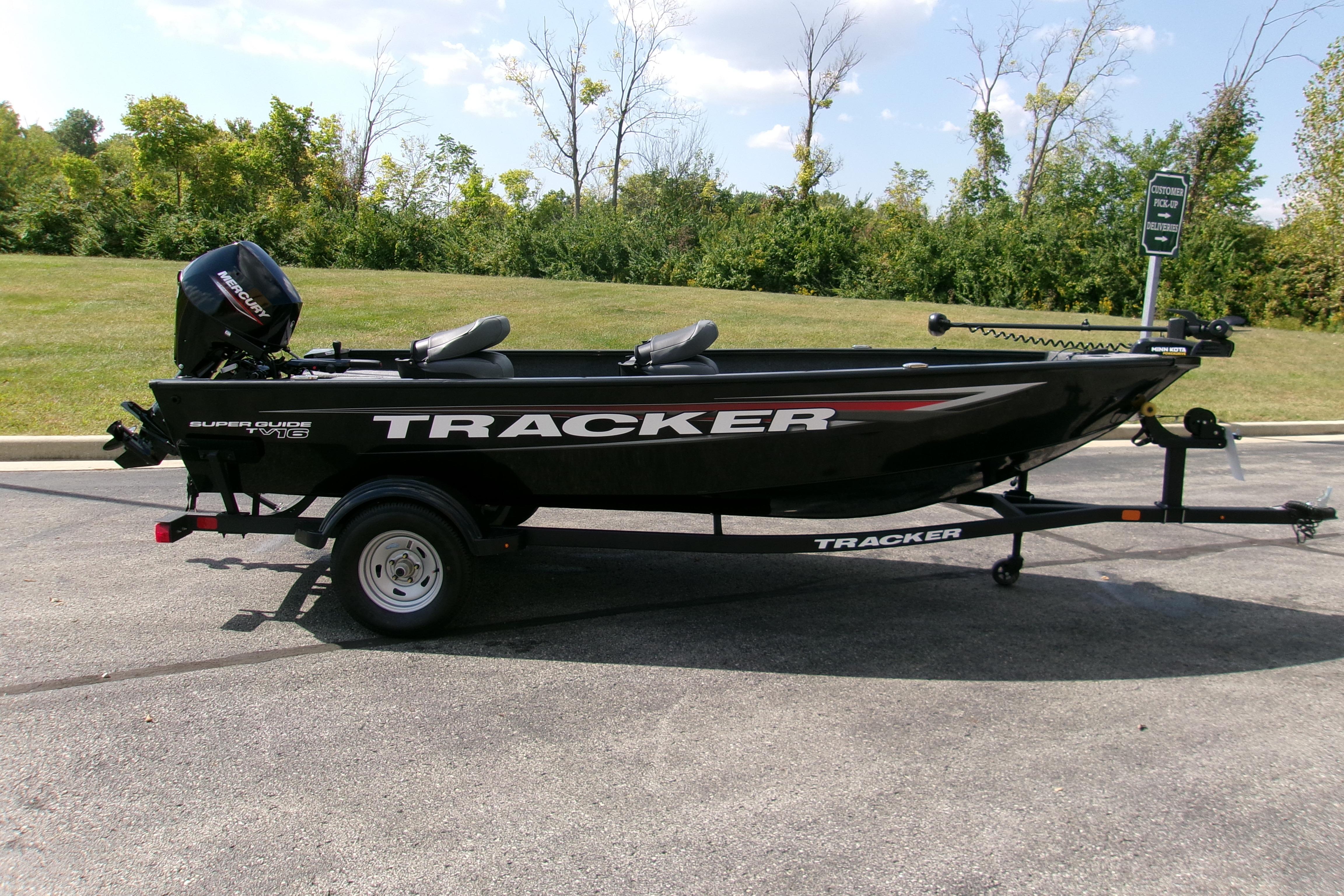 Tracker Super Guide V-16 T 2026 Tracker Super Guide V-16 T boat on trailer, parked outdoors.