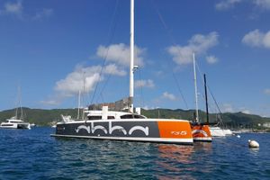 Marsaudon Composites TS5 2019 Marsaudon Composites TS5 catamaran anchored in a scenic bay.