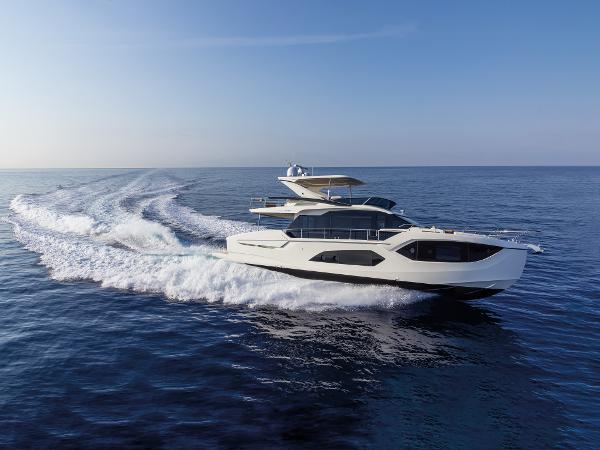 Absolute 60 Fly Co Ownership 2025 Absolute 60 Fly Co Ownership yacht cruising on open sea under clear blue sky.