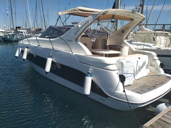 Sessa C35 2008 Sessa C35 yacht docked in marina, featuring sleek design and spacious deck.