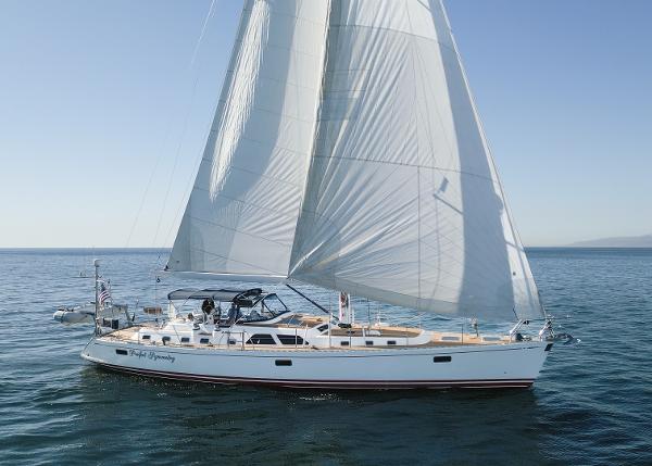 Hylas 70 Sailing yacht Hylas 70, 2006 model, gliding on open water with full sails.