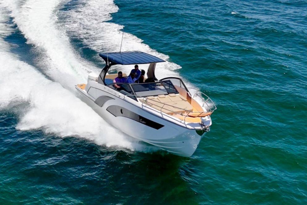 Hanover 347 Inboard 2025 Hanover 347 Inboard boat cruising on open water, showcasing sleek design and performance.
