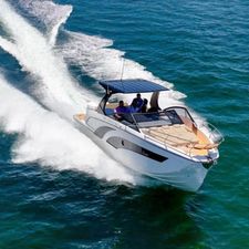 Hanover 347 Inboard 2025 Hanover 347 Inboard boat cruising on open water, showcasing sleek design and performance.