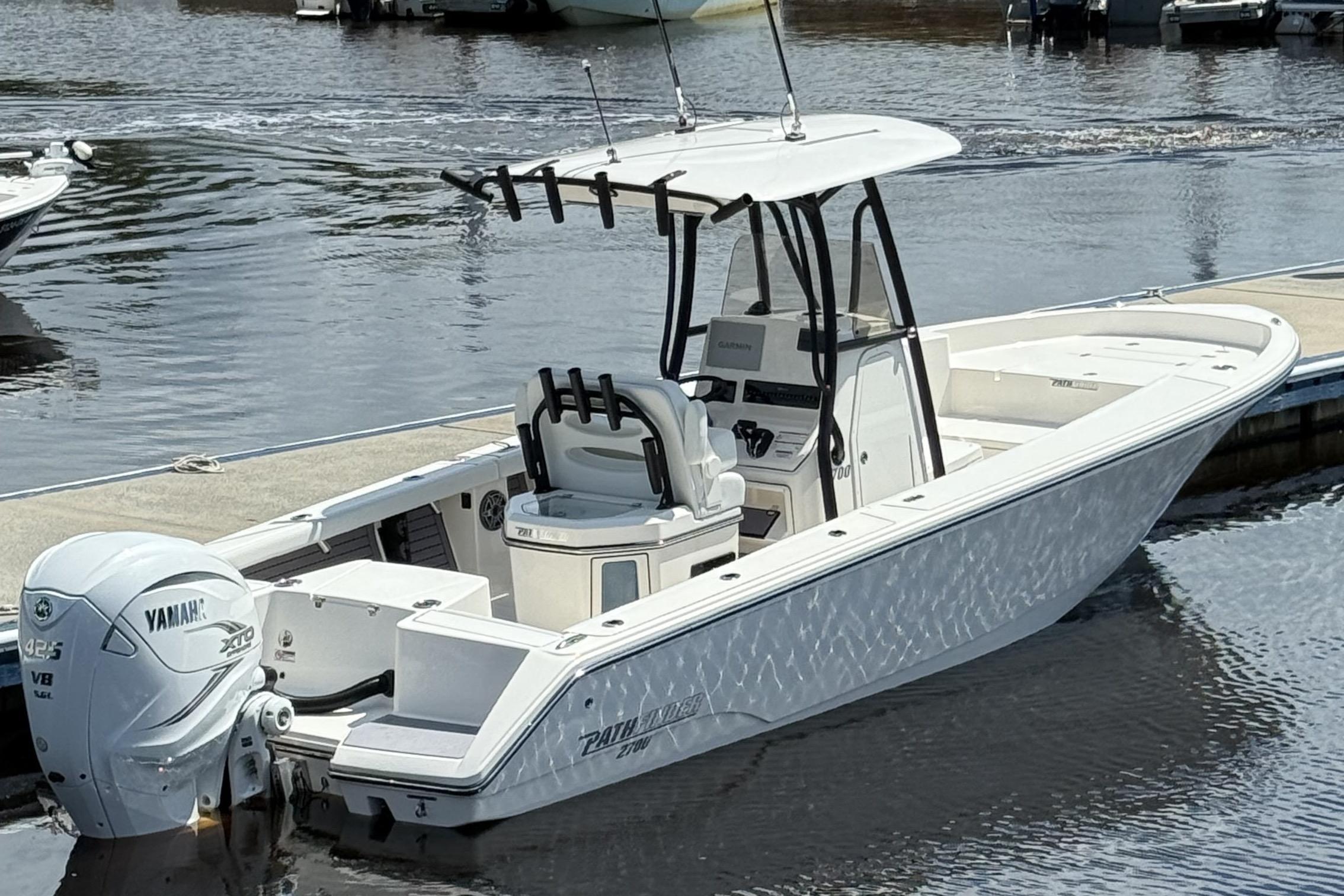 Pathfinder 2700 Open 2024 Pathfinder 2700 Open boat docked, featuring Yamaha engine, sleek design, and modern console.