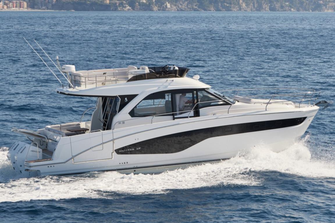 Beneteau Antares 12 Fly OB 2026 Beneteau Antares 12 Fly OB cruising on open water, side view.