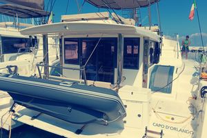 Bali 4.8 2021 Bali Catamarans 4.8 docked, featuring spacious deck and modern design.