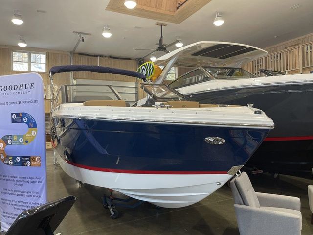 Cobalt R6 2025 Cobalt R6 boat displayed indoors, featuring sleek design and modern amenities.