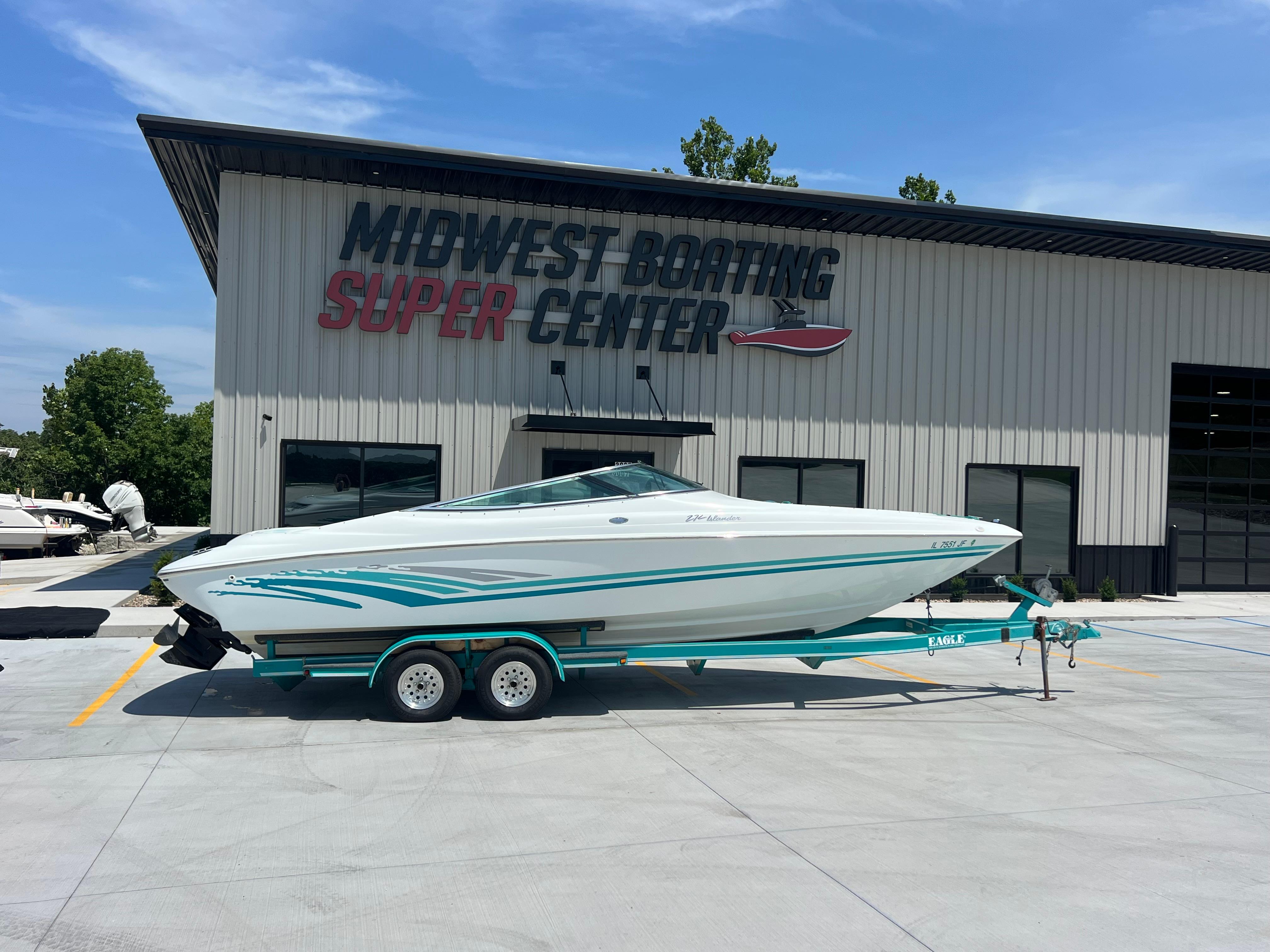 Baja 272 Islander 1999 Baja 272 Islander boat on trailer at Midwest Boating Super Center.