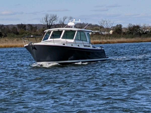 Back Cove 39O 2025 Back Cove 39O cruising on a calm river.