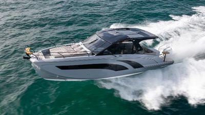 Hanover 387 Outboard 2025 Hanover 387 Outboard cruising on open water, showcasing sleek design and performance.