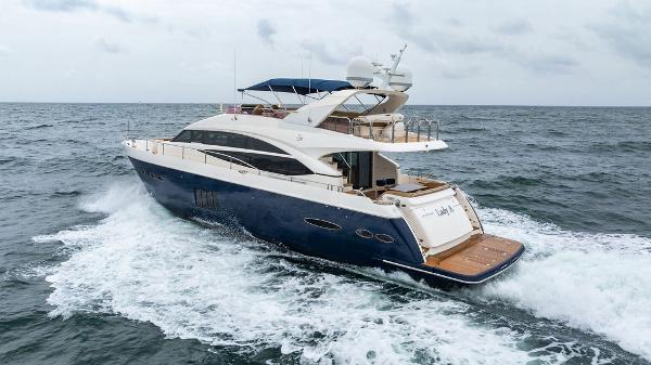 Princess 72 Motor Yacht 2012 Princess 72 Motor Yacht cruising on open sea, rear view.