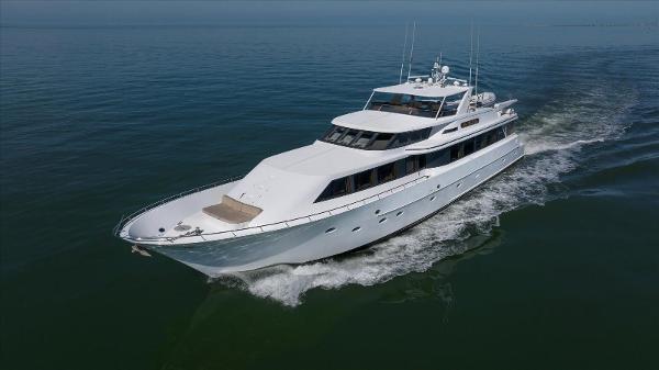 Westport 106 Raised Pilothouse Luxury yacht cruising on open water, Westport 106 Raised Pilothouse, 1995 model.