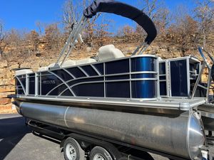 Sylvan Mirage 8522 Party Fish Sylvan Mirage 8522 Party Fish 2025 on trailer, blue sky.