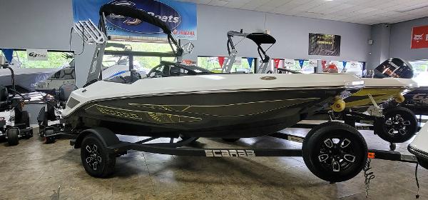 Scarab 165ID 2023 Scarab 165ID boat on trailer in showroom.