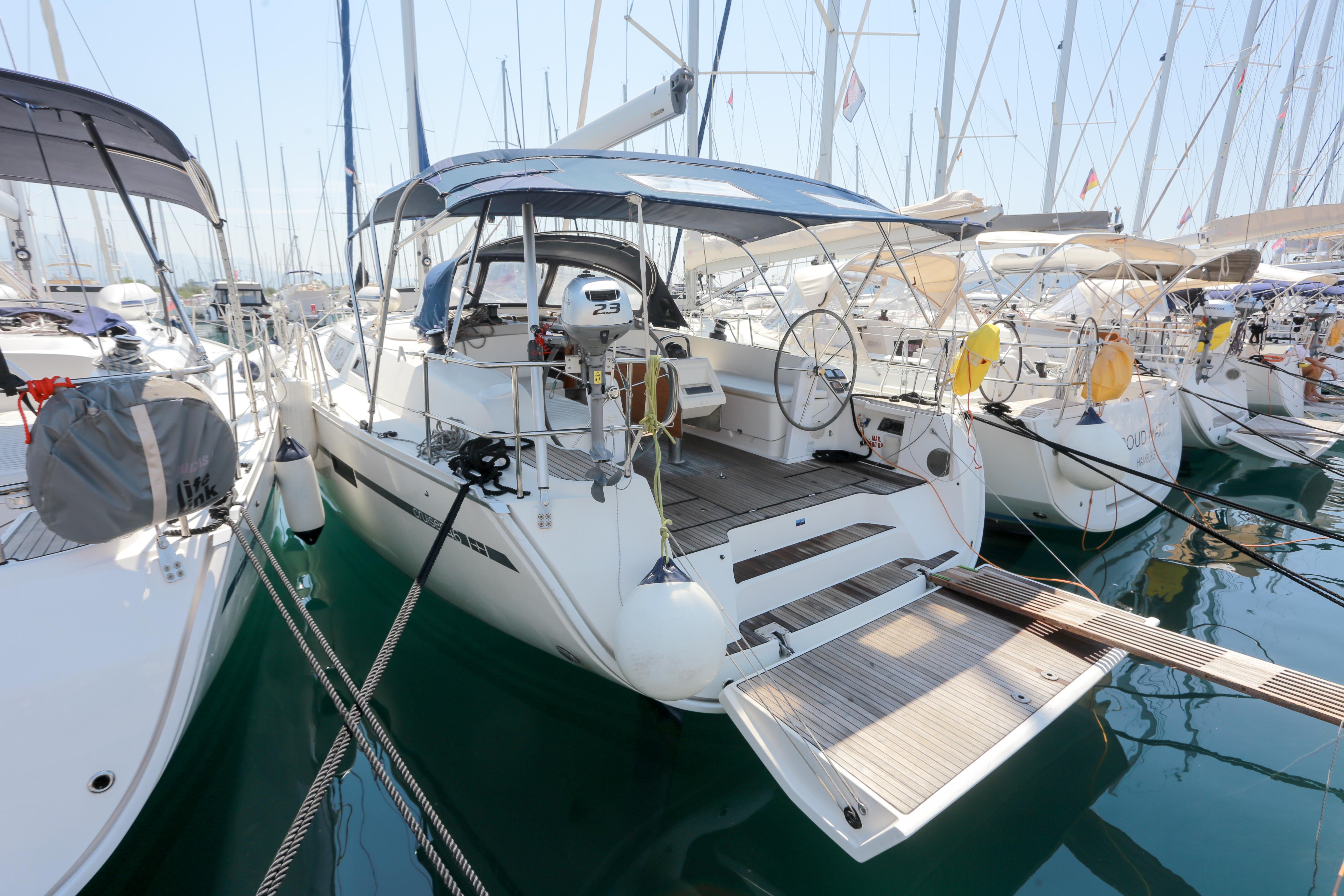 Bavaria Cruiser 46 Bavaria Cruiser 46 yacht, 2016 model, docked in a marina with other sailboats.