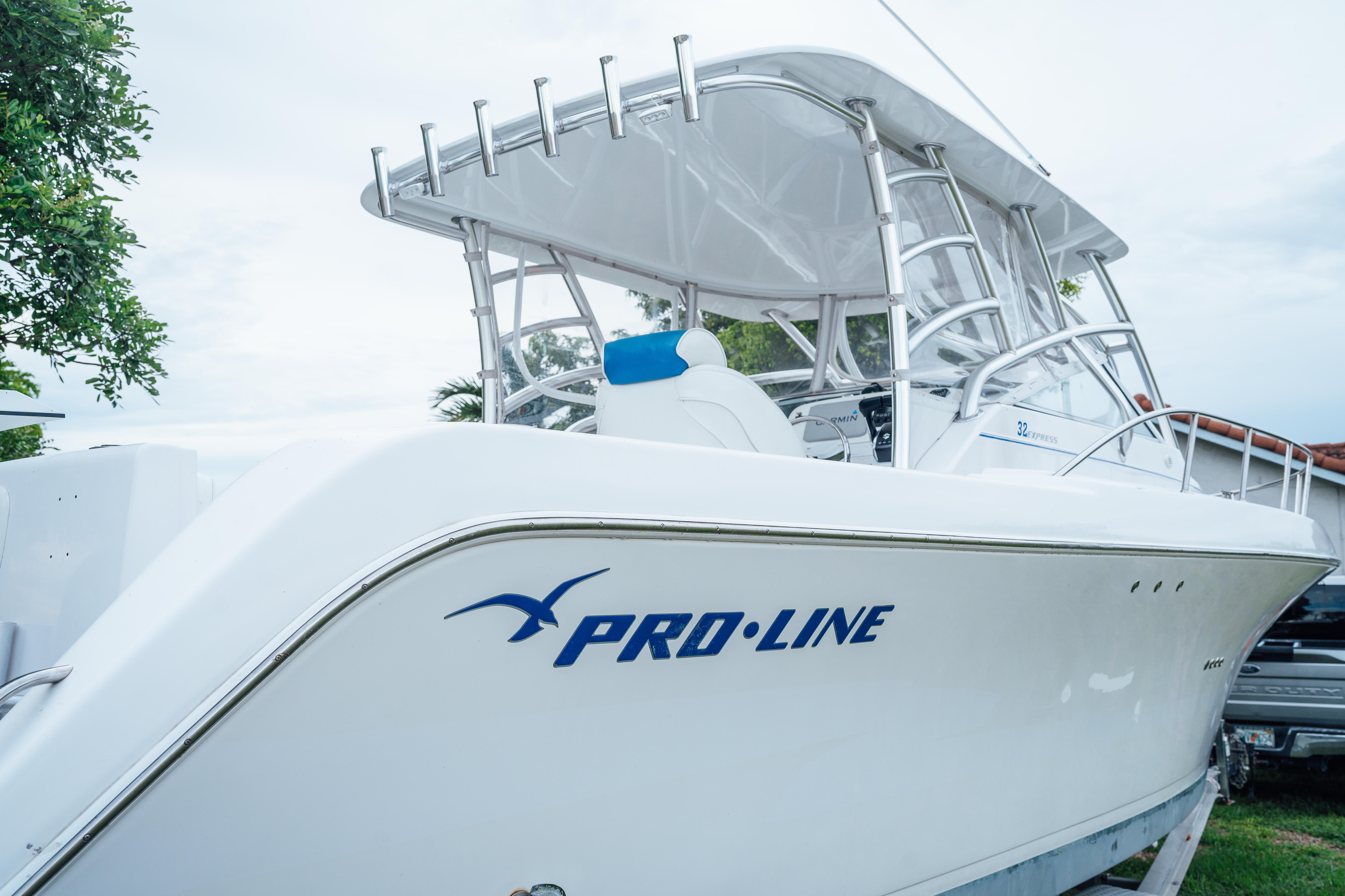 Pro-Line 32 Express 2003 Pro-Line 32 Express boat with sleek design and white exterior.