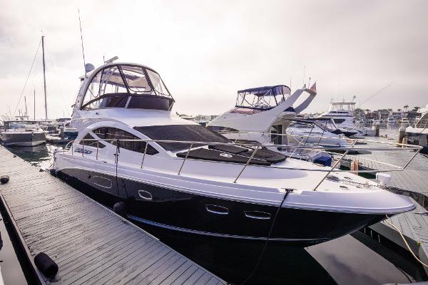 Sea Ray 450 Sedan 2012 Sea Ray 450 Sedan yacht docked at marina.