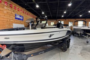 Lund 202 Pro-V GL 2026 Lund 202 Pro-V GL boat displayed indoors on a trailer.