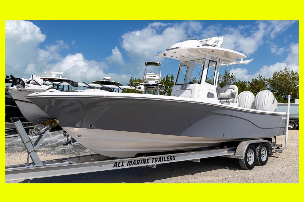 Sea Fox 282 Hybrid LT 2026 Sea Fox 282 Hybrid LT boat on trailer under blue sky.