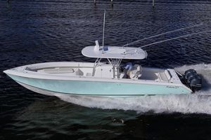 Bahama 37 2011 Bahama 37 boat cruising on water with dual outboard engines.