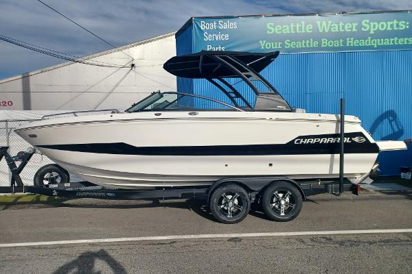Chaparral 247 SSX 2025 Chaparral 247 SSX boat on trailer at Seattle Water Sports dealership.