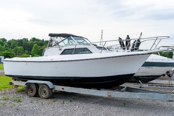 1986 Aquasport 250 Express Fisherman